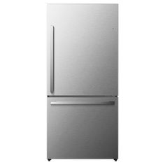 a silver refrigerator freezer sitting on top of a white wall