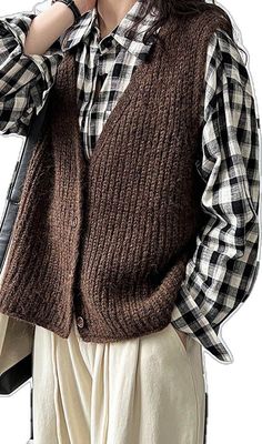 Casual Knitted Vest For Fall, Brown Knit V-neck Vest, Brown Knitted Sweater Vest For Winter, Brown Knitted V-neck Top, Casual Brown Knit Vest, Brown Knitted Sweater Vest For Layering, Brown V-neck Vest For Winter, Fall Knitted Brown Sweater Vest, Brown Vest Sweater For Fall