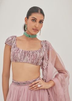 Embroidered blouse and lehenga with embroidered organza dupatta. Glamorous Sets With Sheer Dupatta In Georgette, Organza Pre-draped Saree With Unstitched Blouse, Glamorous Organza Pre-draped Saree With Zari Work, Glamorous Designer Georgette Lehenga, Glamorous Semi-stitched Lehenga With Sheer Dupatta, Glamorous Saree Set With Sheer Dupatta, Glamorous Silk Sets With Sheer Dupatta, Glamorous Georgette Sharara With Unstitched Blouse, Glamorous Lehenga With Unstitched Blouse For Designer Wear