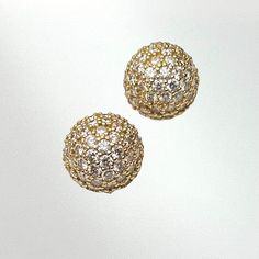 *THIS PAIR IS SOLD BUT CAN BE RE-MADE AS CUSTOM IF ORDERED BY 12/04/24* Cast in 18k yellow gold. These look dainty but pack a lot of bling! These studs are a convex dome shape to maximize the surface area for the diamonds. The pair of studs features over 100 x 1.5mm white diamonds weighing it at a total of 1.5 carats. The diamonds are set in a traditional bead-set pattern known as pavé. Each pavé dome stud measures .45 inches on the ear. - 18K yellow gold - 1.5mm white diamonds - 1.52ctw F-G col Timeless Gold Diamond Earrings With Pave Setting, Classic Gold Diamond Cluster Earrings, Yellow Gold Diamond Earrings With Cubic Zirconia, Classic Diamond Cluster Earrings In Gold, Classic Yellow Gold Diamond Earrings With Sparkling Stones, Timeless Gold Diamond Earrings With Single Cut, Gold Cluster Earrings With Diamond Accents, Timeless Gold Earrings With Pave Setting, Luxury Gold Cluster Earrings With Diamond Accents