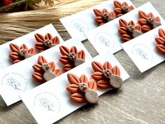 four little turkey magnets on top of white cards