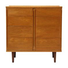 a wooden cabinet with three drawers on one side and two doors at the other end