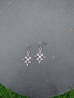 PLEASE read my shop announcement before placing an order so you know what to expect right now. Plus, when ordering from outside Europe, don't forget to provide a phone number for the courier to ensure the fastest and smoothest delivery. Elegant dangle rhinestone starburst earrings, comfortable and lightweight Stainless steel earhooks Stainless steel hooks, won't rust, change its tone or cause you any allergies More Magical celestial jewelry here: https://www.etsy.com/shop/ValkyriesSong?ref=selle Celestial Silver Earrings With Star Charm, Star Charm Metal Drop Earrings, Metal Star Charm Drop Earrings, Silver Star Charm Crystal Earrings For Gift, Single Star-shaped Crystal Earring As Gift, Pierced Star-shaped Metal Jewelry, Pierced Metal Star Jewelry, Metal Star-shaped Jewelry, Silver Celestial Crystal Earrings As Gift