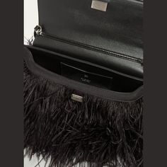 Givenchy "Yoyou" leather east-west shoulder bag with feather trim  Detachable shoulder strap with chain accent  Can be worn as a clutch or shoulder bag  Flap top with magnetic closure  Interior, one card slot  Approx. 5.5"H x 11.8"W x 1.2"D Made in Italy Small Shoulder Bags, Givenchy Women, Travel Size Perfume, Cocktail Jacket, East West, Handbag Shopping, Flap Bag, Sale Design, Pink Bag