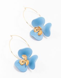 Bring the floral glam with these fun statement earrings. These earrings feature a cool floral design in a vibrant blue tone, so you can add a pop of colour and floral glam all at once. Color: Blue Dimensions: Length 40 mm x Width 35 mm | Lovisa Blue Flower Petal Gold Hoop Earring Cheap Playful Blue Jewelry, Affordable Light Blue Statement Earrings, Cheap Light Blue Statement Earrings, Cheap Blue Statement Jewelry, Affordable Blue Round Flower Earrings, Luxury Blue Flower Earrings, Luxury Blue Flower-shaped Earrings, Cheap Blue Flower Shaped Earrings, Cheap Blue Flower Earrings For Party