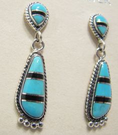 EARRINGS STERLING SILVER BLACK ONIX AND MOTHER PEARL INLAY FROM NEW MEXICO MEASURES: EARRINGS 1 1/2" LONG STAMPED "STERLING" (size and color may vary) Black Southwestern Dangle Earrings, Adjustable Southwestern Black Earrings, Turquoise And Black, Pearl Inlay, Mother Pearl, Earrings Sterling Silver, Silver Turquoise, Turquoise Sterling Silver, New Mexico