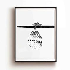 a black and white poster hanging on the wall