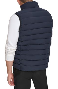 Whether you're deep in the backcountry or just your own backyard, you'll appreciate the cozy core warmth of this vest coated in a water-resistant finish. Front zip closure Stand collar Hidden side-zip pockets Water resistant Lined 100% polyester Machine wash, line dry Imported Outdoor Puffer Vest Jacket Sleeveless, Casual Nylon Hiking Vest, Sporty Outdoor Vest Outerwear, Sporty Vest For Outdoor Activities, Casual Puffer Vest For Outdoor Activities, Sporty Puffer Vest For Outdoor Activities, Quilted Nylon Vest For Cold Weather, Winter Vest With Fleece Lining For Outdoor Activities, Outdoor Puffer Vest With Down Filling