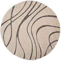 a round rug with wavy lines on it