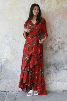 Elevate your summer style with our sustainable Boho Wrap Maxi Dress for women. This red floral maxi wrap dress is the perfect summer outfit. Wrap Dress With Ruffles, Floral Wrap Dress, Wrap Dresses, Red Boho, Festival Vibes, Wedding Guest Looks, Floral Wraps, Versatile Dresses, Wrap Dress Floral