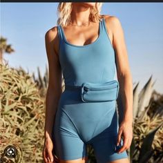 Perfect Brand New Condition Jumpsuit! So Cute!!! I Love The Coordinating Belt Bag! A Cant Miss For Summer! Blue Casual Jumpsuits And Rompers For Workout, Blue Sporty Bodysuit For Loungewear, Blue Athleisure Jumpsuits And Rompers For Summer, Sporty Blue Bodysuit For Loungewear, Blue Athleisure Bodysuit For Summer, Space Pants, L Space, Belt Bag, So Cute