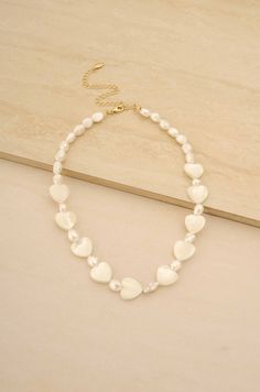 Tender Loving Mother of Pearl Necklace in Gold on slate background Loving Mother, Mother Of Pearl Necklace, Gold Plated Necklace, Mother Of Pearl, Freshwater Pearls, Pearl Necklace, 18k Gold, Gold Plate, Plating