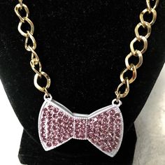 Lovely Lavender Crystal Bow-Tie Necklace And Matching Earring Set Purple Metal Necklace For Party, Trendy Pink Jewelry For Formal Occasions, Trendy Purple Necklace For Gift, Trendy Purple Necklace For Gifts, Adjustable Bow Tie Jewelry For Party, Elegant Pink Jewelry As Fashion Accessory, Elegant Purple Necklace For Party, Trendy Purple Jewelry For Gift, Elegant Pink Jewelry