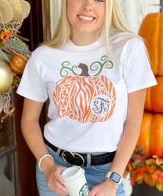 This monogrammed pumpkin tee is too cute and perfect for any occasion this Fall! Perfect for matching family tees! Our personalized graphic tees are so cute and make great personalized gifts! They are perfect for birthdays, family vacations, sporting events, holidays, and so much more! Everyone loves an adorable monogrammed tee at a fantastic price! GILDAN Short Sleeve - 6.0 oz. pre-shrunk 100% cotton Long Sleeve - 6.0 oz. pre-shrunk 100% cotton V-Neck - 4.5 oz. pre-shrunk 100% ring spun cotton Pumpkin Graphic, Family Tees, Family Vacations, Personalized Pet, Sport Event, Graphic Tee, Spun Cotton, Personalized Gifts, Animal Print