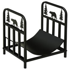 a black metal bed frame with bear and tree silhouettes