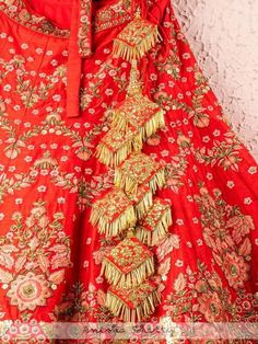 Red And Rose Pink Raw Silk Bridal Lehenga With Embroidery And Net Dupatta (Set of 3) Fabric details: Lehenga - Raw Silk Blouse - Raw Silk Dupatta - Net Embroidery: Lehenga - Zardosi, Resham And Sequence Work Blouse - Zardosi, Resham And Sequence Work Dupatta - Zardosi, Resham And Sequence Work Wash Care Instructions: Dry clean only Note: This product is made to order. No returns The product will be shipped within 4-6 weeks of the order placed Red Silk Thread Sharara With Dori Work, Red Silk Thread Sharara For Wedding, Red Silk Thread Lehenga For Wedding, Red Silk Thread Bollywood Lehenga, Red Bollywood Lehenga In Silk Thread, Red Bollywood Style Lehenga With Silk Thread, Anarkali Silk Thread Lehenga For Traditional Ceremonies, Bollywood Style Red Lehenga In Silk Thread, Red Ceremonial Lehenga For Festive Occasions