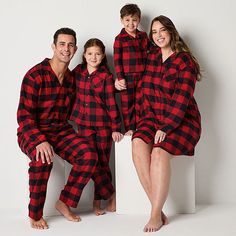 Get prepped for family holiday photos wearing this men's classic buffalo check pajama set by North Pole Trading Co. Crafted from super soft fleece, it includes a long-sleeve pajama shirt with a notch collar and button-front closure, plus a pair of drawstring pants. # Pieces In Set: 21st Piece Description: Top1st Piece Collar: Notch Collar1st Piece Pockets: 1 Chest Slip Pocket(s)1st Piece Apparel Length: 30 Inches1st Piece Fabric: Flannel1st Piece Fiber Content: 100% Cotton1st Piece Care: Tumble… Black Pjs, Family Pjs, Family Pajama Sets, Christmas Jammies, Flannel Pajama Sets, Christmas Pajama Set, Matching Family Pajamas, Family Christmas Pajamas, Holiday Pajamas