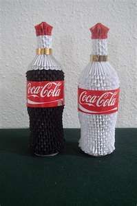 two coca cola bottles made out of yarn