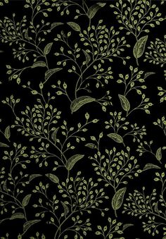 a black background with green leaves on it