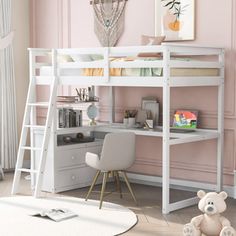 a white bunk bed sitting next to a desk with a teddy bear on top of it