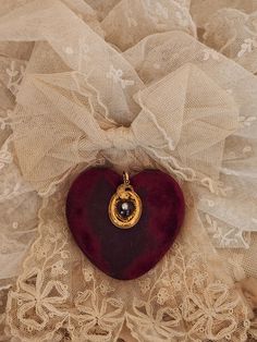 This listing is for an amazing antique Victorian 15K yellow gold heart shaped earth mined garnet and natural pearl keepsake locket/charm. The center garnet measures 7/16" and has a natural pearl set in the center . This garnet is a deliciously juicy Pomegranite color and the natural pearl is dreamy. The old gold has beautiful patina and I have chosen not to clean this piece.  The locket/charm including the bale, measures 1 3/8" long x 3/4" wide. This weighs 3.8 grams. I do  not have a chain with this piece but it has a large round bale so any chain could work. This piece could  also be added to your charm bracelet. The back of the locket has a piece of glass to hold a bit of hair or a keepsake that one holds dear. I have chosen not to remove the glass as I do not want to damage the piece. Victorian Heart-shaped Charms Jewelry, Victorian Heart Charms Jewelry, Victorian Jewelry With Heart Charm For Anniversary, Victorian Yellow Gold Necklace With Heart Charm, Victorian Necklaces With Charms For Anniversary, Victorian Charm Wedding Necklaces, Victorian Charm Necklaces For Wedding, Antique Charm Necklaces For Wedding, Antique Charms Necklace For Wedding