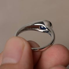 This is a gorgeous handmade creation. Its beauty is its simplicity & Elegance. The 5*7 mm oval shape faceted lab sapphire is crafted in solid sterling silver and with rhodium plated. All item is sent in a beautiful gift box If you have any idea of design your ring,pls contact me directly. You can realize more lovely stuff clicking the link https://www.etsy.com/shop/knightjewelry?refshopsection_shophome_leftnav Please leave the correct address and you phone number for delivering successfully. September Birthstone Rings, Brown Gemstone, Smoky Quartz Ring, Spinel Ring, Blue Sapphire Ring, Party Rings, Engagement Rings Oval, Pink Gemstones, September Birthstone