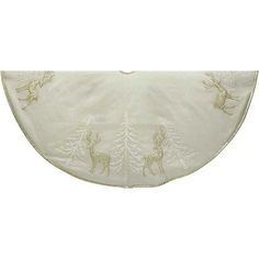 a white table cloth with deers and pine trees on it, in the shape of a half circle