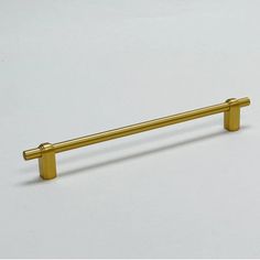 an image of a gold colored handle on a white background with space for your text