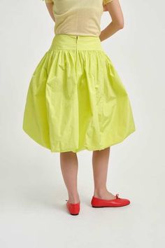 Meet our new emmie skirt - a voluptuous chartreuse taffeta bubble skirt with a flattering basque waistline and deep side pockets. pair with a tulle dress for parties or an oversized tee on your days off.    - 100% polyester (italy)    - invisible zipper at the back    - side pockets    - wash in cool water and hang to dry    - made in canada Dress For Parties, Cropped Flare Pants, Seersucker Dress, Sweater Jumpsuit, Denim Outerwear, Bubble Skirt, Linen Blazer, Green Skirt, London Blue