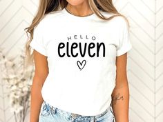 Celebrate a special milestone with our Hello Eleven Youth Shirt! This unique and trendy design is perfect for an 11th birthday celebration 🎉, making it a stylish and fun gift for any Eleven Year Old. Made from high-quality materials, this shirt is not only comfortable but also versatile for everyday wear. Whether it's for a birthday party or casual outings, this Hello Eleven Shirt is sure to make a statement! 🎂 Handmade 100% cotton items How to order: Please select size & style from the drop d 9th Birthday Shirt, Birthday In Heaven, Youth Shirt, 11th Birthday, Kids Graphic Tees, 9th Birthday, Star Shirt, Birthday Shirt, Birthday Shirts