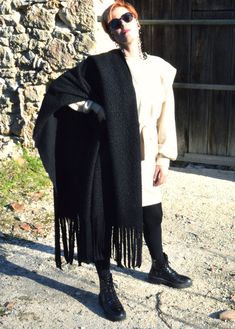 "Large over-sized wool wrap-around scarf with fringe ending, Chunky scarf, wool shawl wrap, winter scarf, warm and comfy, over-coat garment, black blanket , black scarf, meditation shawl for men and women Large oversized shawl wrap for women, wool knitted shawl, wrap in black, teal or black&white colors. This scarf is very soft and comfortable to wear, lightweight but very warm. You can wrap yourself this winter and it will keep you warm. It will be a great accessory for traveling or a gift Black Wool Scarves For Cold Weather, Black Shawl Wrap For Fall, Black Shawl For Fall, Wool Shawl Outerwear For Winter, Black Wool Scarves For Fall, One Size Wool Scarves For Winter, Cozy Winter Scarves With Fringe, Black Scarf For Fall, Black Wool Scarf For Winter