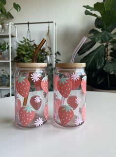 Sip into the warm days ahead with our super cute Strawberry can glass in gorgeous pastel colors. This is the perfect gift for you or the strawberry lover in your life. Use this for all your favorite iced beverages including but not limited to, iced coffees or matcha, protein shakes, cocktails, etc. Get creative and add it to your spring table scape with florals for a modern floral vase- perfect for a party favor! This is the perfect gift for you, Vasos Vintage, Iced Beverages, Cup For Coffee, Cute Coffee Cups, Diy Glass Bottle Crafts, Glass Fruit, Pretty Mugs, Pretty Cups, Basket Gift