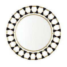 a round mirror with black and gold accents