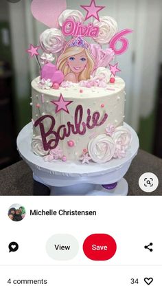 a cake that is sitting on top of a table with the name barbieie written on it