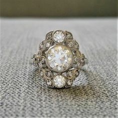 an antique diamond ring on the ground