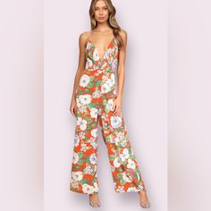 Elevate Your Summer Wardrobe With This Stunning Lulu’s Gone Tropical Jumpsuit, Perfect For Any Occasion. The Vibrant Floral Print And Twist Front Accent Add A Touch Of Glamour To This One-Piece, While The Wide-Leg Design Provides Comfort And Style. The Adjustable Straps And Zip Closure Ensure A Secure And Flattering Fit, Making It Ideal For Travel, Parties, Or Casual Wear. Crafted From A Blend Of Polyester And Rayon, This Jumpsuit Is Lined And Requires Hand Wash Only. Available In Size Large, It Orange Floral Print Summer Jumpsuits And Rompers, Orange Floral Print Jumpsuits And Rompers For Vacation, Orange Floral Print Jumpsuit For Vacation, Orange Floral Print Summer Jumpsuit, Summer Floral Print Jumpsuits And Rompers For Party, Summer Party Floral Print Jumpsuits And Rompers, Orange Floral Print Jumpsuit For Beach, Summer Party-style Printed Jumpsuits And Rompers, Summer Party Jumpsuits And Rompers With Prints