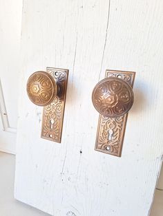 A set of wrought steel geometric pattern doorknobs and plates with a gorgeous bronze plated finish. We have several sets available. Each set consists of two plates, two knobs, a spindle and set screws. All sets are in exellent condition. Please see all of our pictures for details and dimensions. This set ships free within the US. Victorian Door, Architectural Salvage, Drawer Knobs, Knobs And Pulls, Door Knobs, Door Hardware, Flower Patterns, Geometric Pattern, Home Improvement