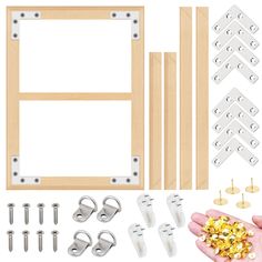 the kit includes several pieces of wood, metal and screws to make a frame