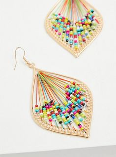 These threaded teardrop earrings feature colorful beads to create a one-of-a-kind design. French hook. Base metal. Imported. The best plus size women's gold-tone & multi bead threaded teardrop earrings in multi. Torrid is your destination for cozy fall and winter clothes to keep you warm and comfortable. Multicolor Wire Wrapped Drop Earrings, Multicolor Wire Wrapped Dangle Beaded Earrings, Gold Bohemian Teardrop Earrings For Summer, Summer Bohemian Gold Teardrop Earrings, Multicolor Wire Wrapped Beaded Earrings, Trendy Teardrop Dangling Bead Jewelry, Trendy Teardrop Jewelry With Dangling Beads, Trendy Gold Beaded Earrings With Dangling Beads, Trendy Multicolor Teardrop Jewelry