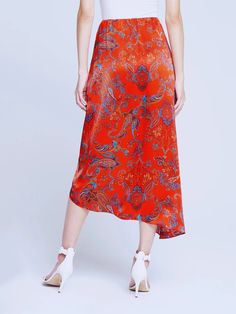 A gorgeous sarong-style midi skirt in pure silk detailed with a fire-red paisley print. Asymetrical sarong panels overlay a front underskirt and tie elegantly at side waist. Flattering smooth elastic waist and no closures. 100% Silk. Great Neck New York, Sarong Skirt, Turquoise Print, Red Fire, Unique Dresses, Sarong, Wrap Skirt, Guest Dresses, Skirt Top