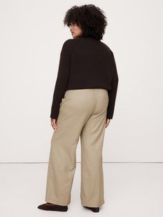 Reach for these pants when you need to strike a balance between sharp tailoring and all-day comfort.  We cut them from an all-season wool flannel fabric, adding a pull-on design so you can wear them high-rise or lower on the hips.  Relaxed: An easy silhouette throughout.  High Rise (12")with a straight fit through the thigh and wide leg.  Pull-on design with concealed elastic waistband.  Side-seam pockets.  Unlined.  Wide leg fit: High rise (12") with a straight fit through the thigh and wide le Easy Silhouette, Flannel Pants, Wool Flannel, Flannel Fabric, New Woman, First Look, Wide Leg Pants, Banana Republic, Personal Style