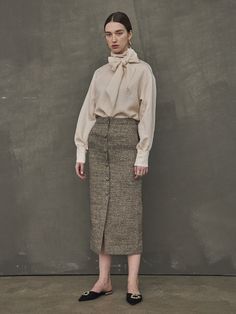 Editor's NotesLuxurious feminine mood tweed material skirt with a stylish silhouette that is great to style both formally and casually. It is great to style in a luxurious ways with various of blouse tops.- Long length pencil skirt- Unique linen material summer wear- Elegant and luxurious wear- Great to style with same material tweed jacketMeasurements(in.)S / M- Total Length: 33.07 in. / 33.46 in. - Waist: 12.60 in. / 13.58 in.- Hip: 17.13 Classic Tweed Skirt For Work, Fitted Tweed Elegant Skirt, Elegant Fitted Tweed Skirt, Chic Tweed Skirt For The Office, Chic Tweed Skirt For Office, Formal Fall Tweed Skirt, Formal Tweed Skirt For Fall, Elegant Tweed Skirt For Fall, Elegant Tweed Skirt For Formal Occasions