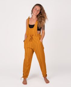 Take up the beauty of any new adventure in these unique hippie overalls! Designed with a striped pattern, cotton fabric, and a tie string to keep you snug. Features multiple pockets in the front, on the sides, and in the back- you can hold your most cherished belongings without trouble. These are true boho overalls with tie-on and ankle adjustments - adjust as you please! Add a Soul Flower cropped tank under these overalls for some cute, hippie vibes! Ethically made in Nepal. 100% cotton. Pineap Hippie Overalls, Boho Overalls, Cotton Overalls, Pineapple Express, High Neck Crop Top, Hippie Vibes, New Adventure, Organic Clothing, Halter Crop Top