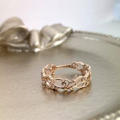 a gold ring sitting on top of a table