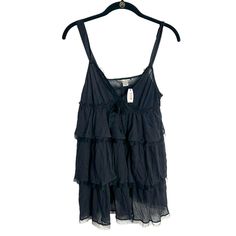 Victoria's Secret Nwt Black Top Blouse Sz L Sleeveless Sheer Ruffle Tiered Bow Questions? Leave A Comment Below! Approximate Layflat Measurements: Under Arm To Under Arm: 15 Shoulder To Hem:30 Stretchy Bin 15.11 Chic Ruffled Tank Top For Layering, Black Sleeveless Blouse For Daywear, Black Cami Tank Top With Ruffles, Black Ruffled Cami Tank Top, Black Ruffled Tank Top, Ruffled Camisole Tank Top For Daywear, Sleeveless Ruffled Top For Layering, Summer Ruffle Camisole For Night Out, Summer Night Out Ruffled Camisole