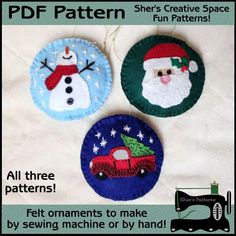 three handmade christmas ornaments with santa claus and snowman on the front, one is blue