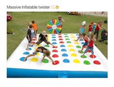 several people are playing on an inflatable game