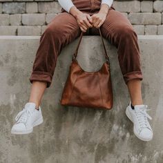 Our leather purses for women bring handmade fashion to practical function — like this beautiful soft brown leather shoulder bag. The clean vintage style makes this purse a beautifully simple addition to any outfit for any woman. On-the-go Satchel Shoulder Bag With Brass Hardware, Casual Shoulder Bag With Leather Lining For On-the-go, Casual Leather Crossbody Shoulder Bag, Leather Crossbody Hobo Bag With Smooth Grain, Casual Textured Leather Hobo Bag For On-the-go, Brown Leather Shoulder Bag With Smooth Grain, Casual Textured Leather Hobo Bag, Casual On-the-go Shoulder Bag With Leather Lining, Everyday Vintage Brown Satchel With Leather Lining