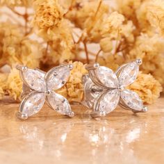 0.80 TCW  Marquise Stud Earrings / Moissanite Stud /Marquise Cut Diamond Earrings / Minimalist Flower Earrings / Floral Studs / Wedding Gift by crystalcavejewels ------------------------------------------------------------------------------ "** 𝐃𝐞𝐬𝐜𝐫𝐢𝐩𝐭𝐢𝐨𝐧 𝐨𝐟 𝐑𝐢𝐧𝐠 **" ● Diamond Details *Shape : Marquise Cut  *Weight : 0.80 TCW Approx. (0.10 CT Each ) *Size : 4 x 2 MM  *Color : D *Clarity : VVS *Luster : Excellent *Make : High Quality ● 𝐌𝐞𝐭𝐚𝐥 𝐃𝐞𝐭𝐚𝐢𝐥𝐬 👉 Metal Type: 𝟗 Diamond White Flower Shaped Earrings For Wedding, Diamond White Flower-shaped Earrings For Wedding, Wedding Cubic Zirconia Crystal Earrings In Flower Shape, Flower Shaped Cubic Zirconia Crystal Wedding Earrings, Wedding Crystal Earrings With Cubic Zirconia In Flower Shape, Flower Shaped Cubic Zirconia Bridal Earrings As Gift, Flower Shaped Cubic Zirconia Crystal Earrings For Wedding, Cubic Zirconia Bridal Earrings In Flower Shape, Classic Diamond White Flower Earrings For Gift