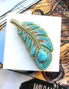 This beautiful feather brooch handembroidered using Japanese glass beads, metal thread and turquoise stone.9.5 cm * 4 cmlooks amazing*free shipping* Everything is handmade, newer glued!* Not a toy for kids.*Just click the "Add to cart" and this beautiful brooch will be tenderly wrapped and travel to you Friend Handmade Gifts, Feather Brooch, Tambour Embroidery, Bird Beads, Bead Stitching, Toy For Kids, Aari Work, Beaded Brooch, Gift For Friend